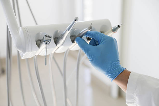 Professional Invisalign Clear Aligners technician working in Plainview, TX